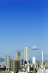 Fototapeta na wymiar 東京都市風景　池袋　高層ビル群　サンシャイン　快晴　青空　コピースペース