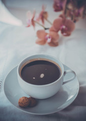 Cup of coffee, coocies and orchids. Instagramm look.