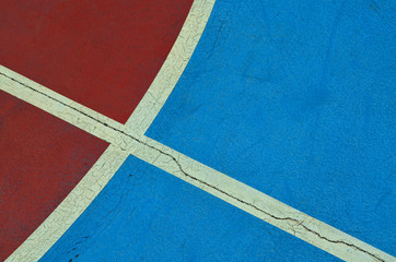 Fototapeta na wymiar Red and blue concrete basketball floor background