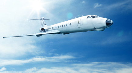 Fototapeta na wymiar Modern airplane in sky on sunny day