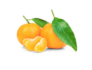 Two juicy tangerines with leaves on white background