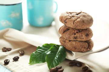 Delicious coffee cookies on napkin