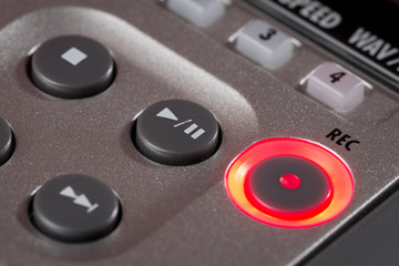 Fototapeta premium Red record button illuminated on recorder