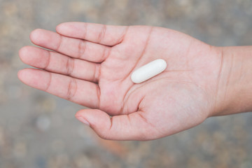 Medicine vitamin or capsules in hand, Medicine in palm