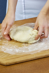 Woman rolls squeezes dough Handmade Series Food recipes