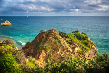 Rock Beach Praia da Rocha in Portimao. Algarve. Portugal. Beach and rock formation known as Praia da Rocha in travel destination Portimao. Algarve, Portugal, Europe