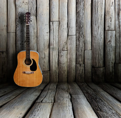 Obraz na płótnie Canvas Guitar in vintage wood room.
