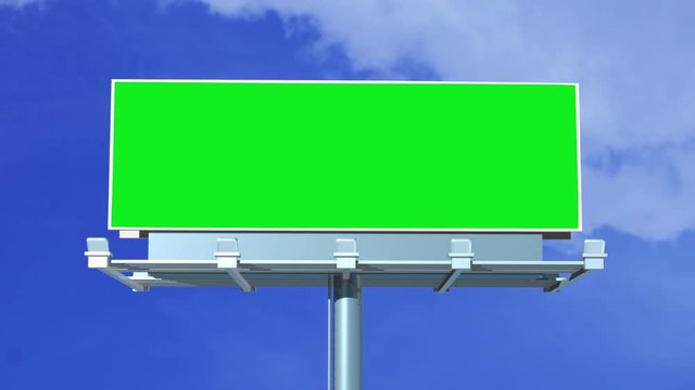 Timelapse of a big blank billboard with green color under clear sky
