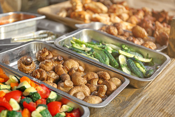 Grilled vegetables and meat on table