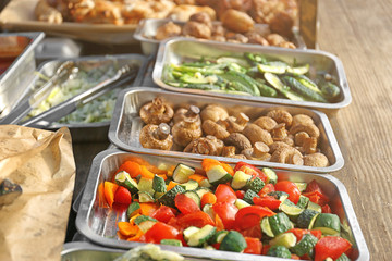 Grilled vegetables and meat on table