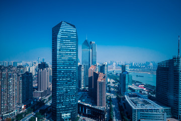 Fototapeta na wymiar modern business buildings in financial district in city of China.