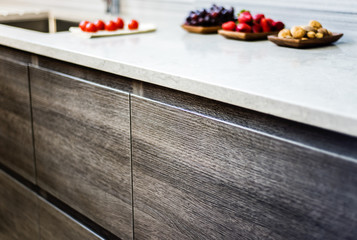Modern kitchen cabinets made of natural wood for home interior renovation