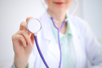 Doctor with a stethoscope in the hands