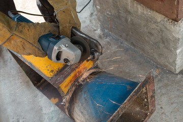 Man cutting steel