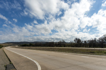 Wind farm horizon road empty filter copyspace.