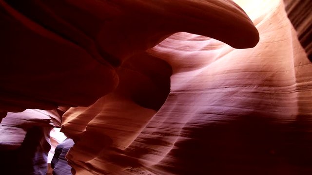 This canyon was carved over the millennia by flash floods that sometimes roar through the canyon, forming these colorful and sensuously curved walls. Landscape having features characteristic of the su