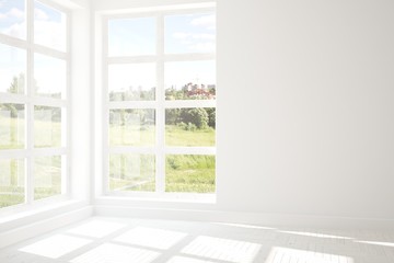 Fototapeta na wymiar White empty room with green landscape in window. Scandinavian interior design
