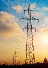 silhouette of high voltage electrical pole structure.