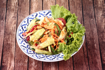 Spicy and sour mixed vegetable salad with cucumber.