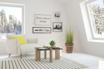 White room with sofa and winter landscape in window. Scandinavian interior design