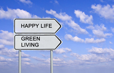 Road sign to happy life and green living