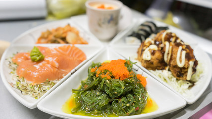 janpanese food set  consist of seaweed, salmon sashimi, etc