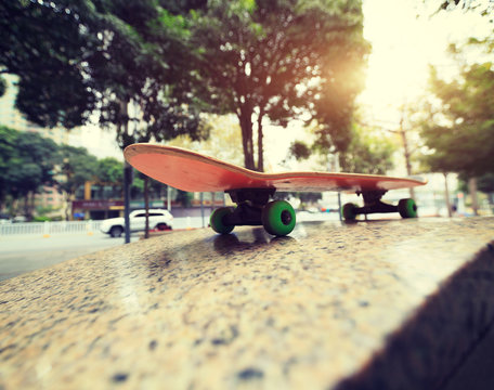 closeup of  skateboard at city skatepark waiting for riding