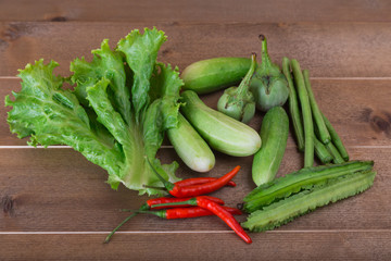 group of vegetable cucumbers,thai eggplants,long beens,Winged beans,lettuce,chilli.