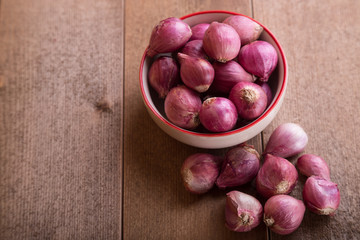 shallots in white bowl