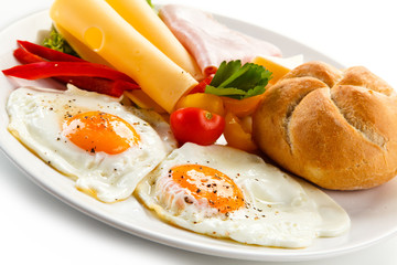 Breakfast - fried egg, ham, and cheese 