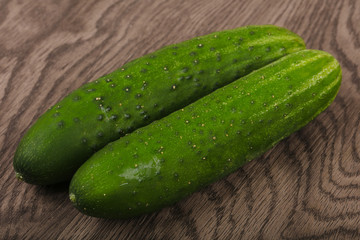 Two green cucumbers