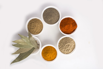 Spices in Bowl on white background