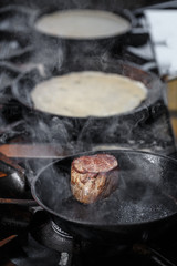 Beef steak fried in pan