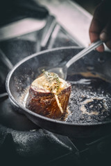 Beef steak fried in pan