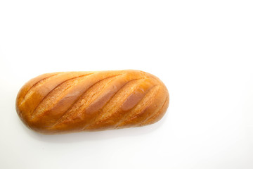 A loaf of wheat bread isolated on white background