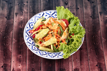 Spicy and sour mixed vegetable salad with cucumber.