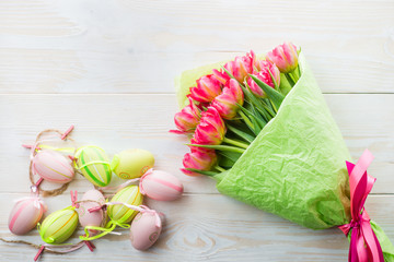 bouquet of tulips on a white wooden background. View with copy space