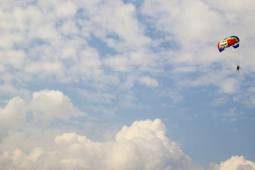 Travel to Sankt-Wolfgang, Austria. The parachutist in the sky.