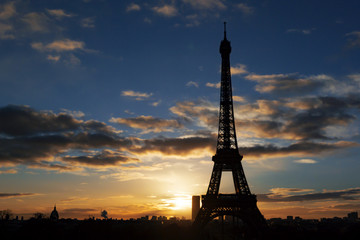 Fototapeta na wymiar Eiffel Tower silhouette with sunset background