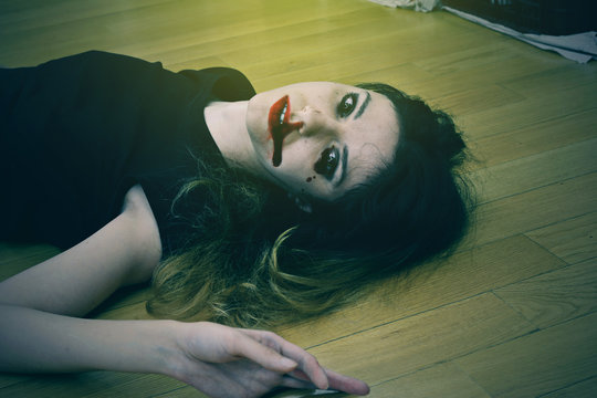 Close up on a dead girl on the floor