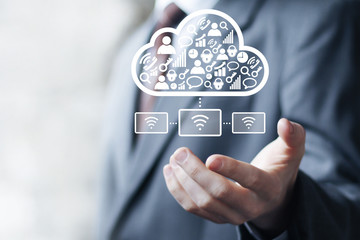 Businessman pressing button cloud computing network