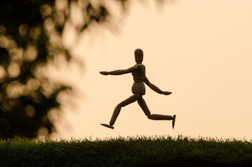 wooden dummy jumping have feeling happiness