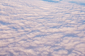 Blue sky with cloud, airplane view.