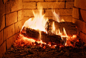 Burning fire wood in a fireplace