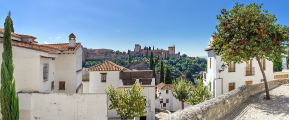 Panoramic view of the Alhambra. The Arabian quarter Albaicin and the view of the world famous Alhambra in Granada. - obrazy, fototapety, plakaty