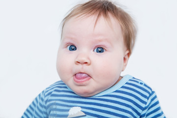Baby with funny face.