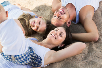 Fototapeta premium View from above on adult parents with children