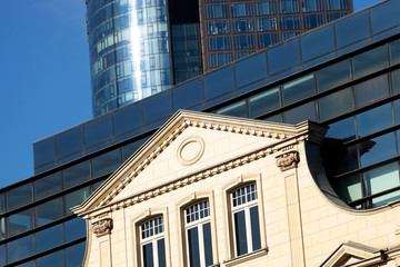 Obraz premium Office glass facade and historic building
