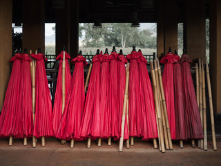 stack of red umbrella