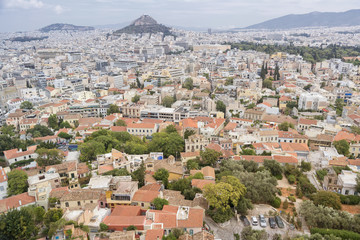 Fototapeta na wymiar Cityscape of Athens from the hilltop near Parthenon, Acropolis of Athens, Greece.